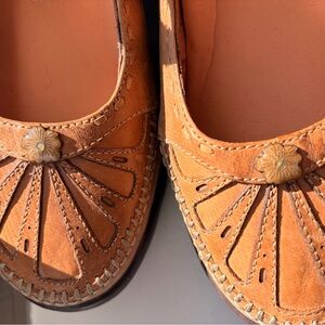 Chic Tan Women's Flats with Floral Accent